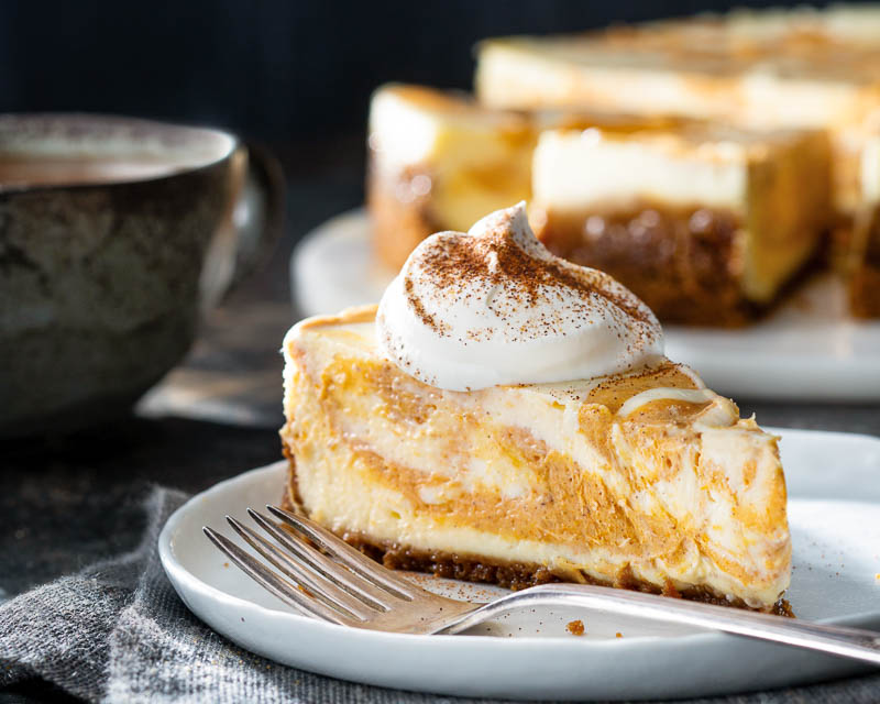 pumpkin spice cheesecake slice on plate