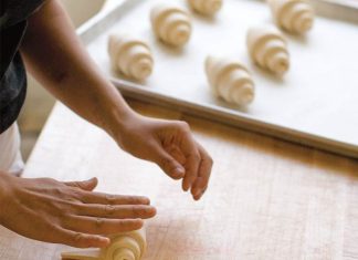Tartine Bakery: San Francisco, CA tartine bakery rolling croissant on wooden block