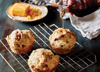 Bacon Cheddar Poppy Seed Muffins Bacon Cheddar Poppy Seed Muffins on wire rack with pouring syrup