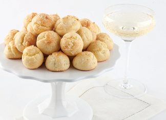 Gougères Gougères with champagne on white