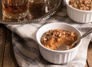 Sweet Potato Cornbread Pudding with Bourbon Sauce Sweet Potato Cornbread Pudding with Bourbon Sauce on linen with spoon