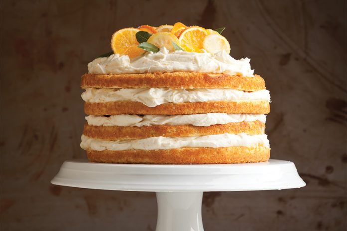 Victoria sponge style citrus cake with lemon curd and mango