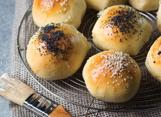 Bread Rolls Bread Rolls with poppyseed and sea salt on wire rack