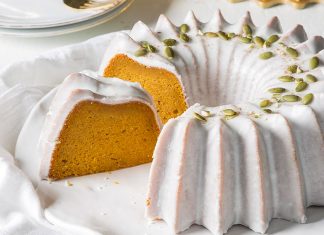 Pumpkin Mascarpone Bundt Cake with Mascarpone Glaze Pumpkin Mascarpone Bundt Cake sliced on white plate