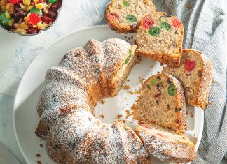 Fruitcake Bundt Fruitcake Bundt sliced on white plate