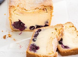 Gâteau Basque Loaf Gateau Basque Loaf sliced on white surface