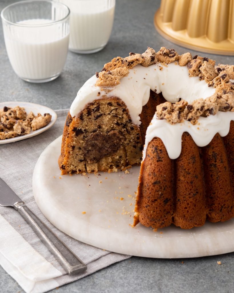 Cookies & Milk Bundt Cakesliced on marble