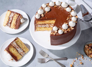 Baking School In-Depth: Kyiv Cake kyiv cake sliced, high angle on blue gray surface