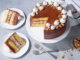 Baking School In-Depth: Kyiv Cake kyiv cake sliced, high angle on blue gray surface