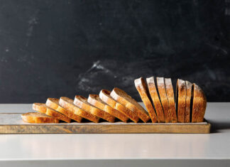 Sourdough Sandwich Loaf Sliced loaf of sourdough bread on a cutting board