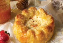 Baked Pastry-Wrapped Cheese Baked pastry-wrapped cheese with honey drizzle