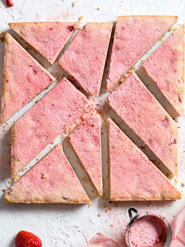 Strawberry and Rosemary Shortbread on White Counter with Sieve