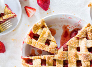 7 Pie Perfections for Your Easter Extravaganza 6 Pie Perfections for Your Easter Extravaganza Strawberries & Cream Pie in white pie dish with two slices on white plates with forks