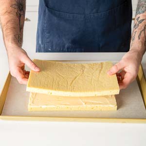 Stacking cake layers on baking pan