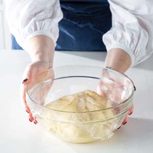 Place dough in covered bowl