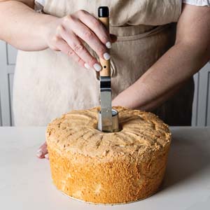 Removing cake from center piece of cake pan