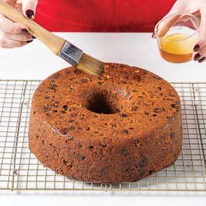 Brushing Brandy on the cake