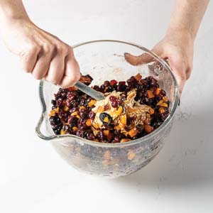 Mixing fruit and batter