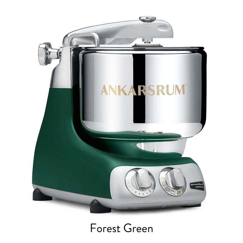 Forest green Ankarsrum stand mixer with chrome bowl and control dials on a white background.