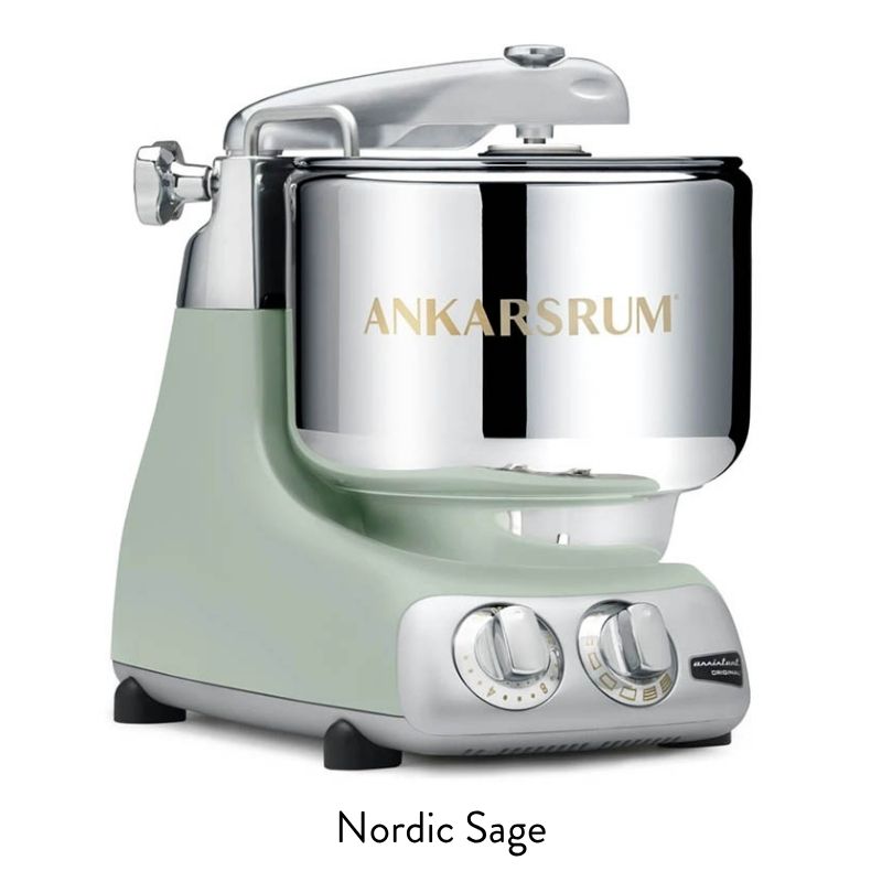 Nordic Sage stand mixer with chrome bowl and dual front dials, a sleek kitchen appliance on the counter.