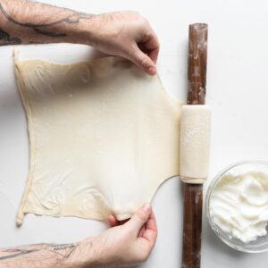 rolling dough with rolling pin