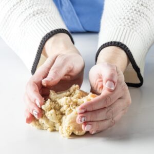 shaping almond paste with hands