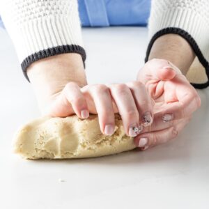 shaping almond paste with hands