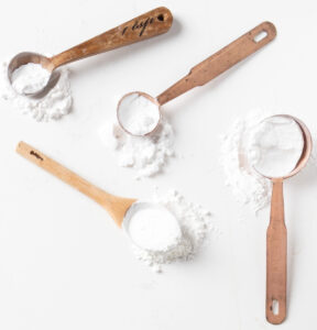 Starches on wooden measuring spoons