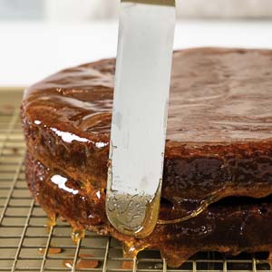 Spreading glaze on cake layers