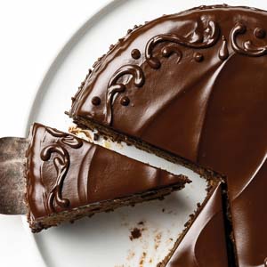 Cutting a slice of Sacher-Torte