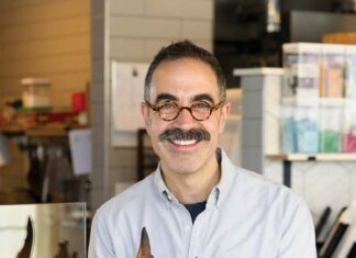 The Rise of Small State Provisions The Rise of Small State Provisions Kevin Masse with a basket of baguettes inside of Small State Provisions