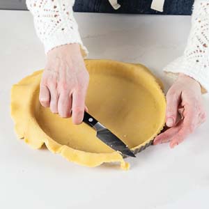 Sablee3607SWSSquares - Bake from Scratch Trimming pie dough with knife