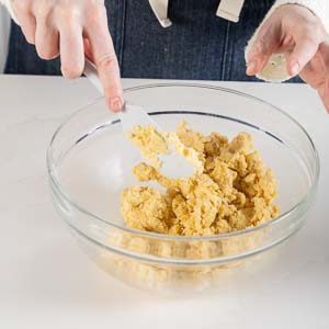 Sablee3634SWSSquares - Bake from Scratch Mixing sablee dough with spatula