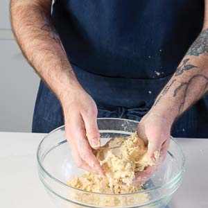 Mixing dough with hands