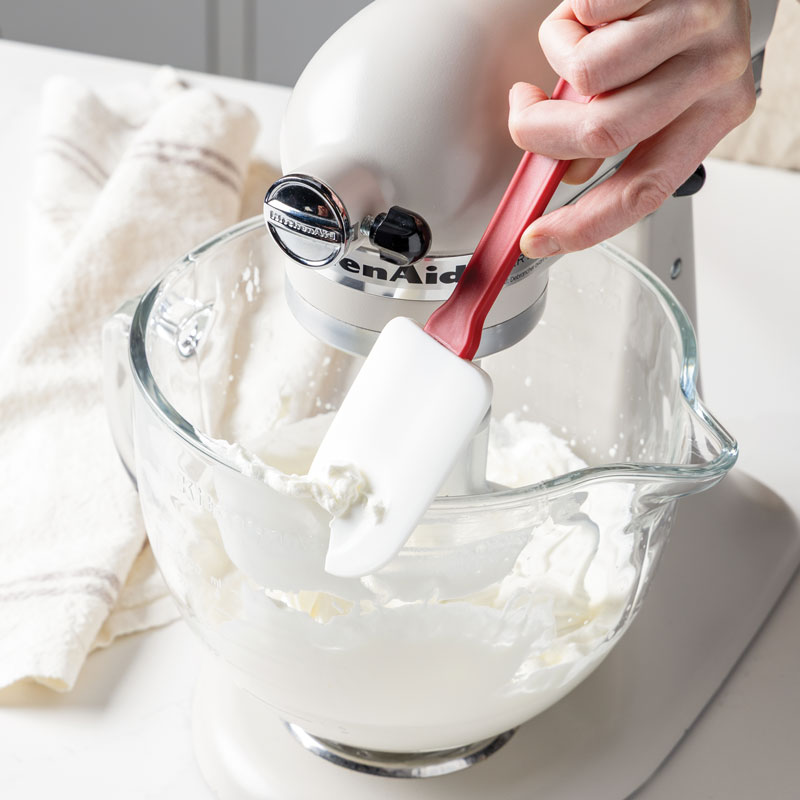 Red spatula on mixing bowl