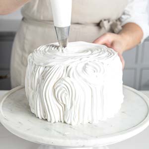 Frosting top of cake