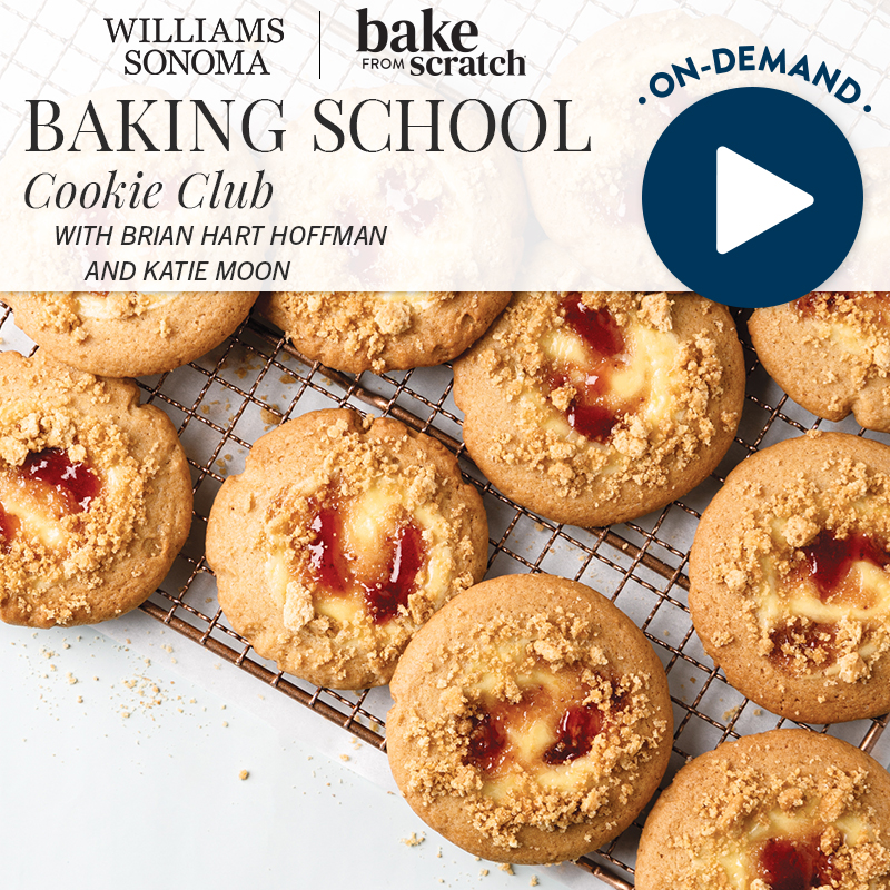 Promo banner for Bake from Scratch Cookie Club with hosts Brian Hart Hoffman and Katie Moon; large on-demand play button overlay with cookies on a cooling rack in the background.