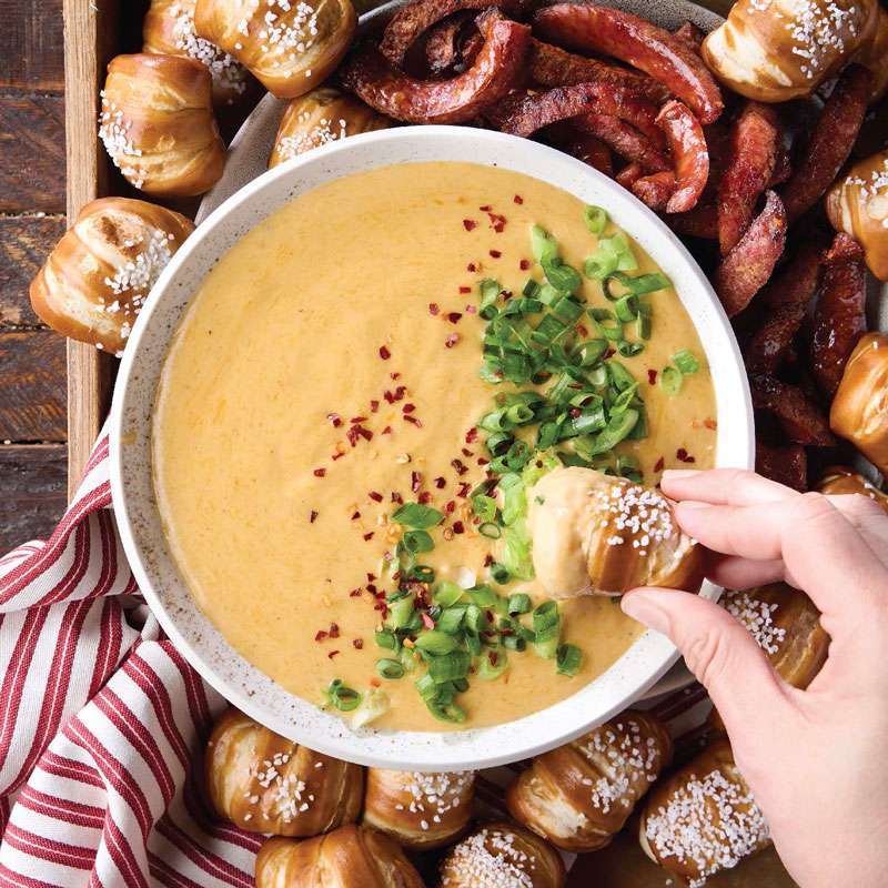 Beer cheese dip with soft pretzel bites
