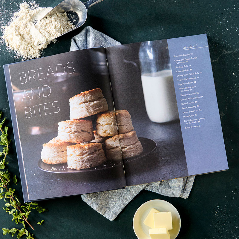 Comfort Made Delicious styled internal spreads with flour, butter, napkin, and greens