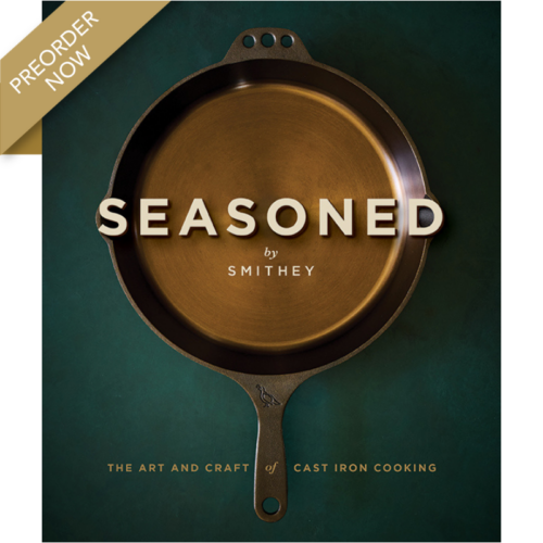 Book cover for Seasoned by Smithey, a guide to cast iron cooking, featuring a copper skillet on a green background with a preorder ribbon.