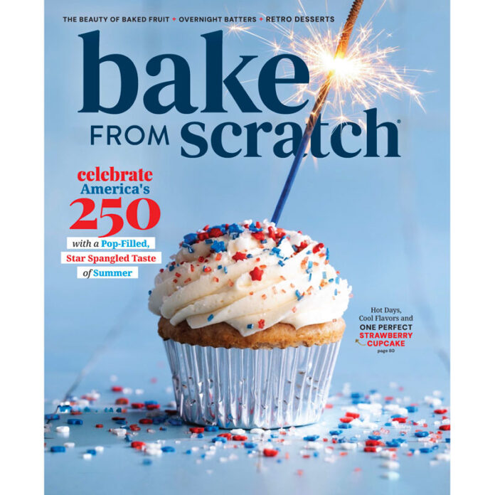 Cover of Bake from Scratch magazine featuring a cupcake with white frosting, red/blue sprinkles, and a lit sparkler on a blue background